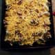 Sprinkle shredded cheese on top of macaroni. Bake for 30 minutes.