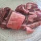 Stewing lamb has much more fat than leg of lamb. It is therefore a cheaper cut.