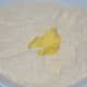 Step Two: Add butter and mix. Pour water little by little and softly knead to get a smooth and pliable dough.