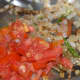 Step three: Add chopped tomatoes. Stir-cook on medium high fire till they become tender but not mushy.