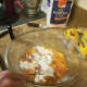 Step 2: In a large bow, mix peaches, flour, sugar, vanilla, and cinnamon together. 