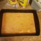 Step 3: Pour peach mixture into the bottom of a 13 x 9 baking pan.