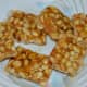 The peanut chikki is ready. Eat these crunchy, sweet bars whenever you desire. Store them in an airtight container for future use.