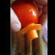 poke into tomato by stem