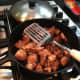The chicken being sautéd.