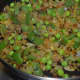 Step three: Throw in green peas and chopped capsicum. Saute for 3-4 minutes.