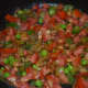 Step four: Add chopped tomatoes. Stir-cook on a high flame for 3 minutes or till they become soft, not mushy. Add some water to keep the mix moist.