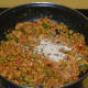 Step nine: Throw in dry mango powder and sugar. Stir the mix for 30 seconds.