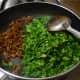 Step five: Add chopped fenugreek leaves. Mix well with the seasonings. Cover and cook till they are done.