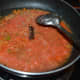 Step 7: Add tomato puree. Stir-cook till the water evaporates from the mix.