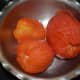 Step two: Take the tomatoes out of the pot. The skin of the tomatoes should have loosened. Set aside for cooling. Remove the skin when they have cooled. Chop the flesh. Make a smooth tomato puree. 