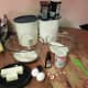 Gather your supplies and ingredients. You will need 1 large bowl, 1 medium bowl, 13x9 inch baking pan greased/sprayed, sugar, butter, water, eggs, vanilla extract, all-purpose flour, cocoa powder, baking powder, salt, nuts/powdered sugar (optional).