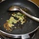 Saut&eacute; the  cumin in oil until it sizzles. Throw in the ginger-garlic-green chili paste. Saut&eacute; for 30 seconds.