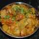 Transfer the curry to a serving dish. Serve it with roti, chapati, or flatbread. Enjoy!