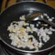 Step Three: Add chopped onions. Continue sauteing till they become translucent.