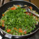 Step Six: Add chopped fenugreek leaves. Stir-cook for another 4 to 5 minutes. 
