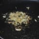 Step Two: Saute garlic and ginger in oil.