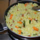Step five: Your favorite lemon rice with diced carrots is ready.