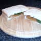 Cut fish fingers and green beans sandwich