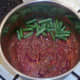 Green beans are added to curry sauce