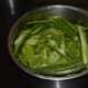 Collect the ridge gourd peels in a container.