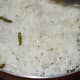 Step three: Add cooked rice. Mix well.