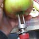 poke prongs into apple at stem