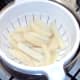 parboiled chips are drained and left to steam