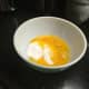 Combine the 1 1/2 cups of sugar, and 1/2 teaspoon of salt, with the 1 egg and the 6 egg yolks. Beat or whisk together until the sugar has been well dissolved.