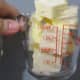 melt the butter in a cup in microwave. It will fit in a regular glass cup. Yes.