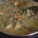 Step eight: Add two cups of water. Bring the mix to a boil. Add amchur powder. Simmer for two minutes. Turn off the stove. Your favorite mixed vegetable curry is done!