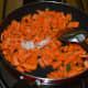 Step two: Increase the heat. Add some salt. Mix well. Stir-cook for 3 minutes.