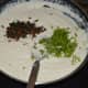 Step four: Add tempering as per instructions. Also, throw in finely chopped coriander leaves. Mix well.