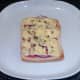 Cracked black pepper seasons cheese