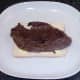 Rested steak is laid on first slice of bread