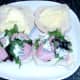 Ham, blue cheese and mixed leaf salad on rolls