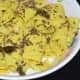 The tempering poured over the khandvi.