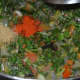 Step six: Add red chili powder and coriander powder. Mix with the other contents in the pan. Saute the mix for a minute.