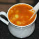 Pour the soup to a deep cup. Garnish with a few chopped coriander leaves. Enjoy drinking this yummy soup!