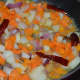 Step four: Add about 3 cups of water. Mix well. Cover the pan and cook on a low heat till the veggies become soft. Turn them occasionally.