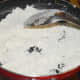 Step three: In the same pan, saute all-purpose flour with some ghee. Saute for 5 minutes or until you get a nice aroma.