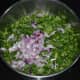 Step two: Add chopped fenugreek leaf and chopped onions to the batter. Mix well.