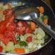 Step four: Throw in chopped tomatoes. Cook till they become somewhat mushy.