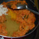 Step six: Add garam masala powder, turmeric powder, remaining salt, sugar, and dry mango powder. Saute for a minute.