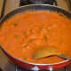 Step eight: Add some water, remaining salt, and sugar. Bring the mix to a nice boil. Simmer for 2 minutes. Turn off the heat.