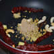 Step two: Saute the spices and cashew nuts in some oil as per instructions.
