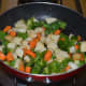 6. Add remaining oil to the same pan. Saute the veggies for 3 minutes. 