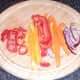 Peppers and onion sliced for cooking