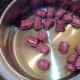 Browning chopped up venison sausages