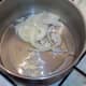 Sliced onion and garlic ready to be sauteed